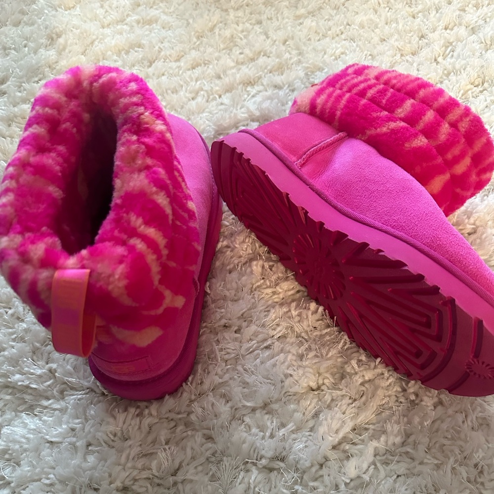 Brand new never worn Ugg boots - pink with striped fur pattern size 10